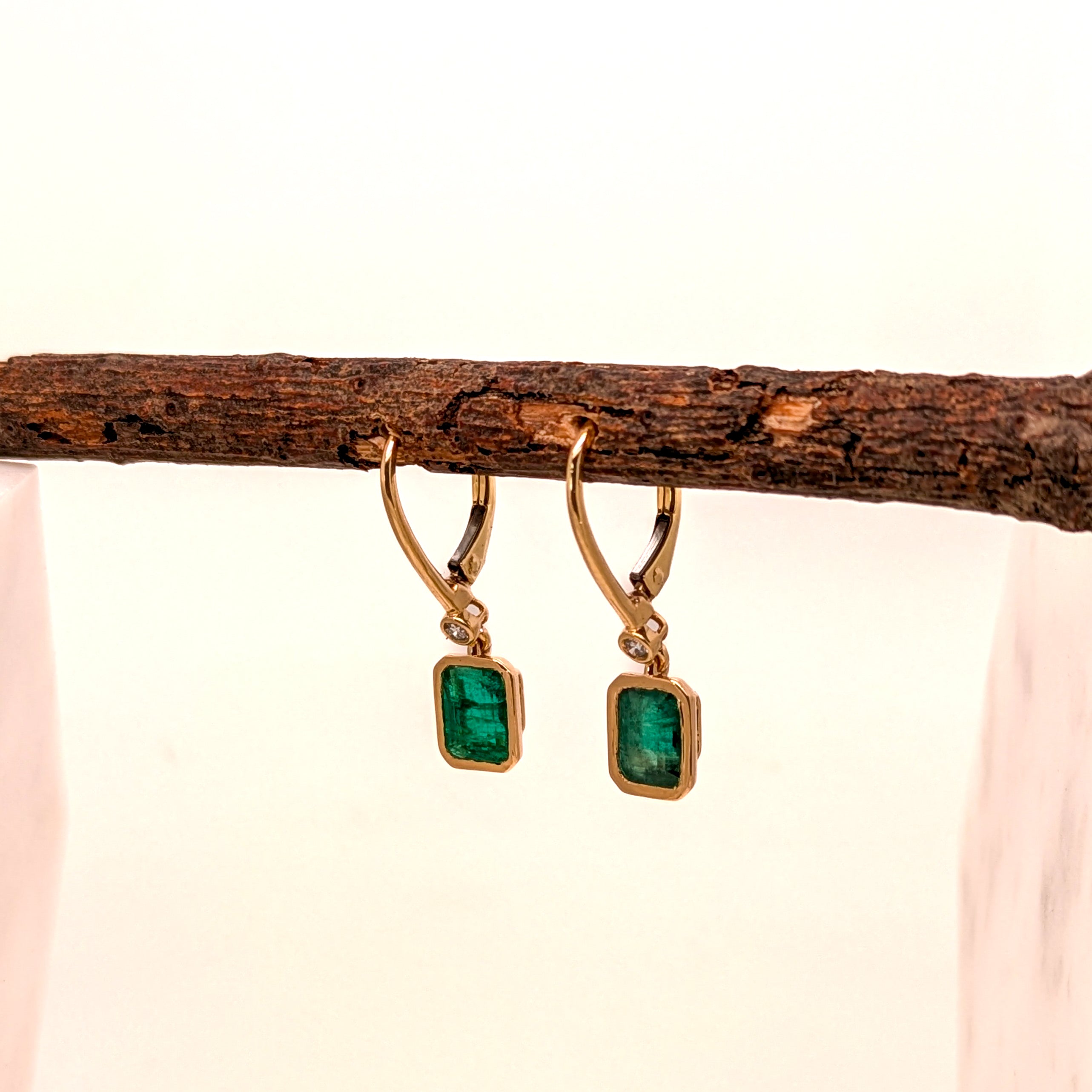 dina 14k yellow gold 0.07cts emerald diamond hoop earrings | emerald cut 7x5mm