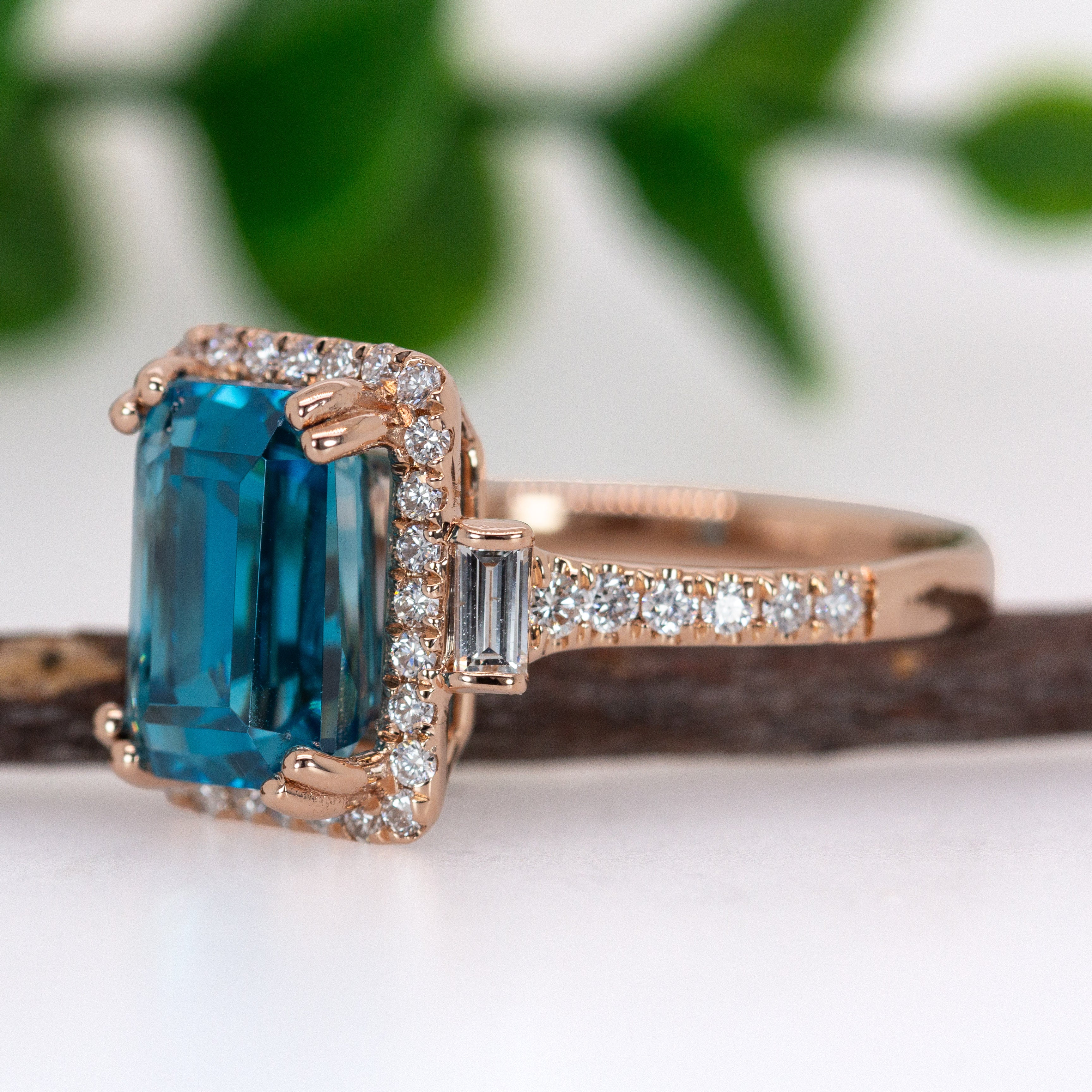 Tanvi 14K Rose Gold 6.68cts Blue Zircon Diamond Ring | Emerald Cut 9.5x7mm