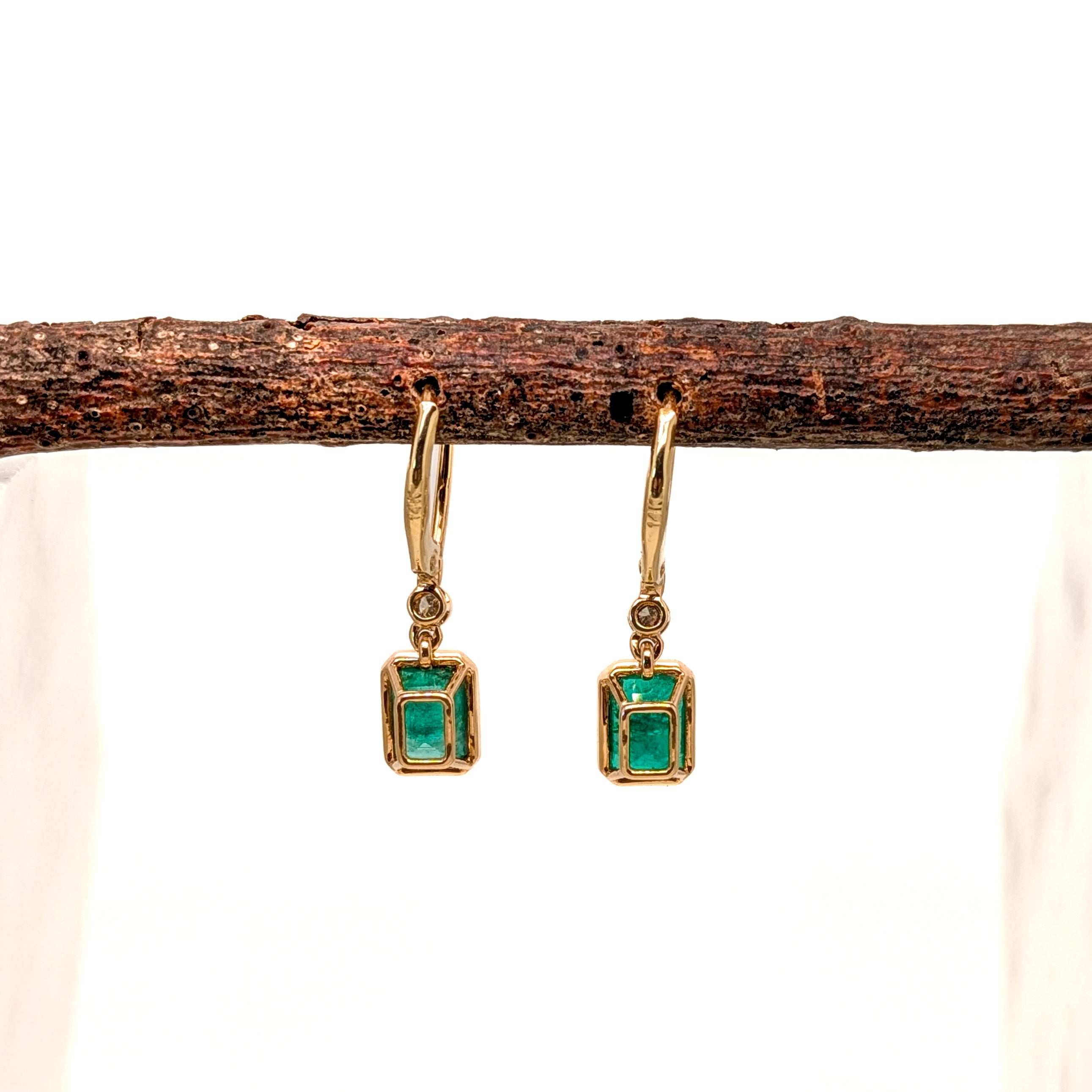 dina 14k yellow gold 0.07cts emerald diamond hoop earrings | emerald cut 7x5mm