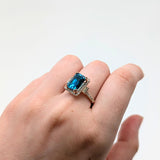 Tanvi 14K Rose Gold 6.68cts Blue Zircon Diamond Ring | Emerald Cut 9.5x7mm