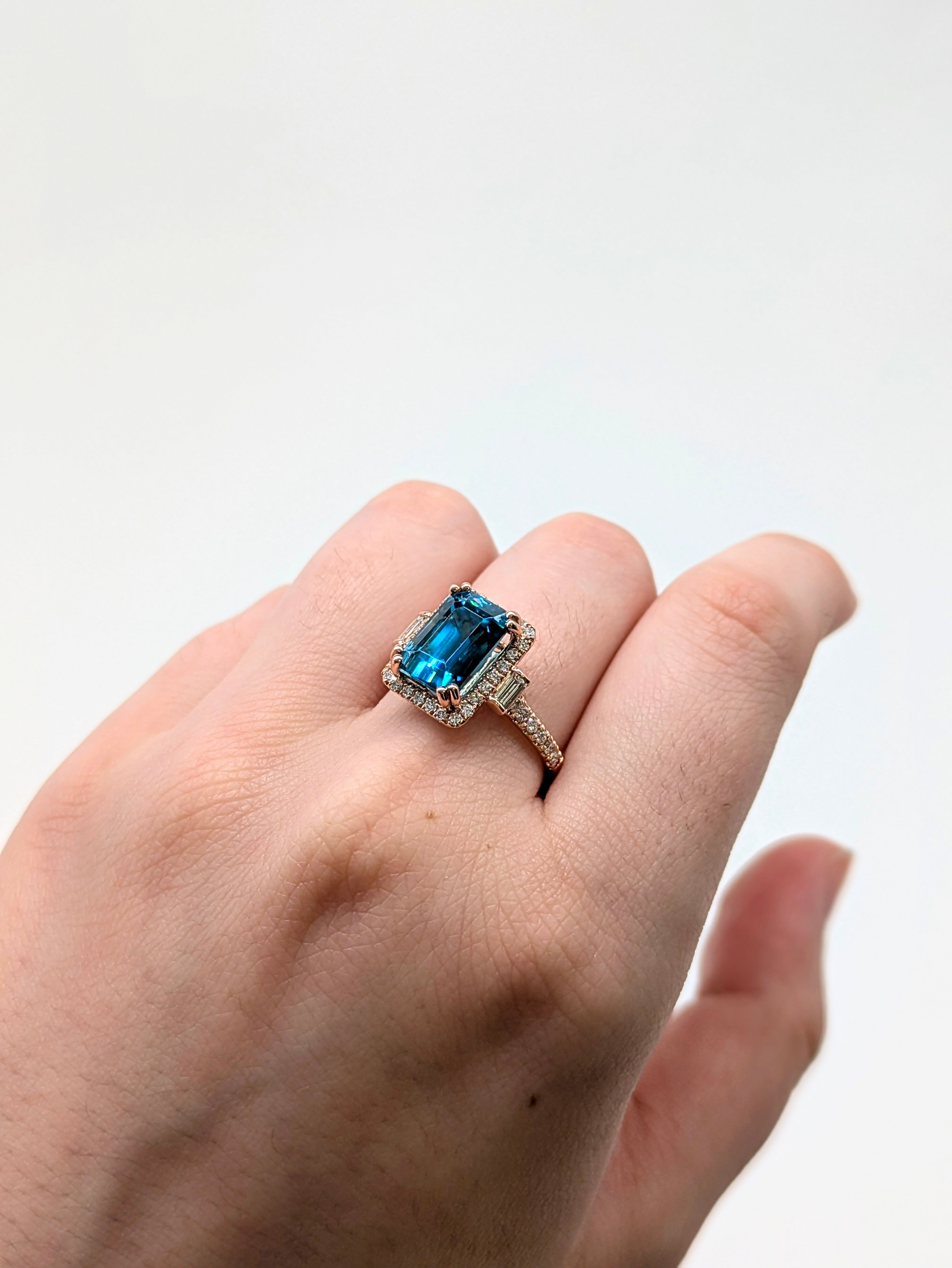 Tanvi 14K Rose Gold 6.68cts Blue Zircon Diamond Ring | Emerald Cut 9.5x7mm