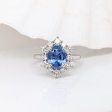 2.4ct Blue Sapphire Ring with Diamond Halo