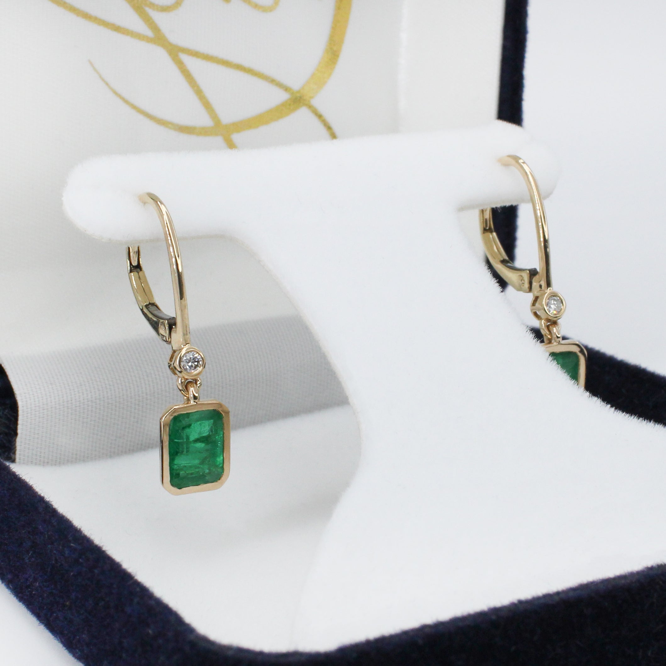 dina 14k yellow gold 0.07cts emerald diamond hoop earrings | emerald cut 7x5mm