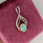 Pendants-Multi Color Ethiopian Opal Pendant in 14K Solid Gold W Diamond Accents & Diamond Studded Bail | Oval 9x7mm | Play of Fire | Customizable - NNJGemstones
