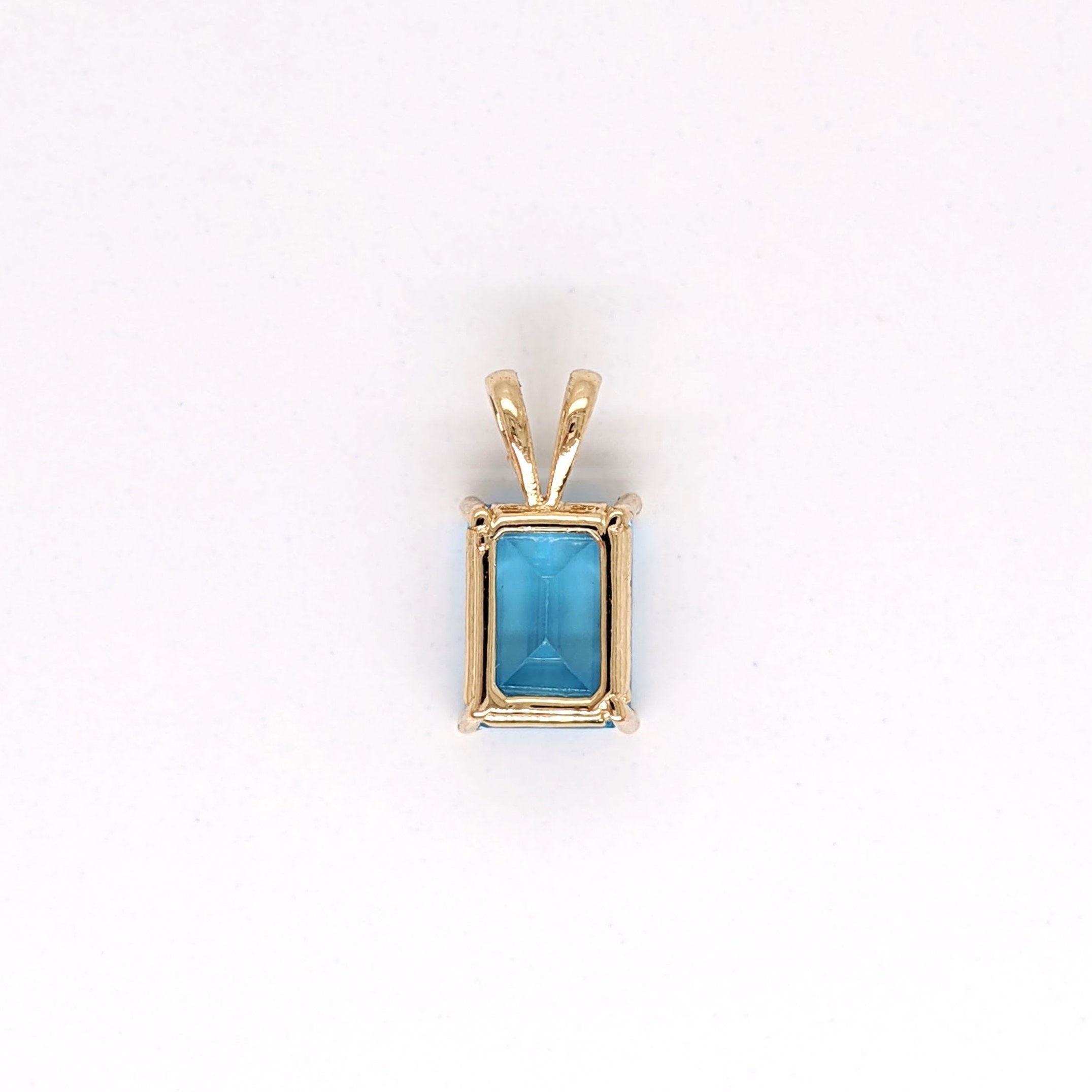 Pendants-Solitaire Swiss Blue Topaz Pendant in Solid 14k White, Yellow or Rose Gold | Emerald Cut | Rabbit Bail | Blue Gemstone | November | Sizes - NNJGemstones