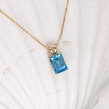 Pendants-Solitaire Swiss Blue Topaz Pendant in Solid 14k White, Yellow or Rose Gold | Emerald Cut | Rabbit Bail | Blue Gemstone | November | Sizes - NNJGemstones