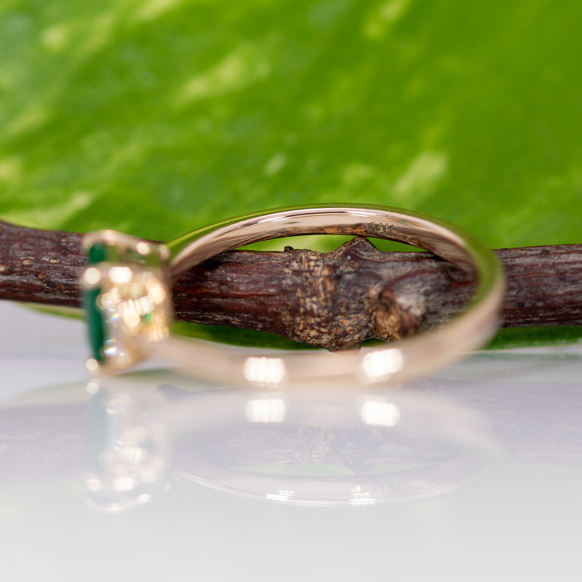 14K yellow gold colombian emerald ring with diamond accents