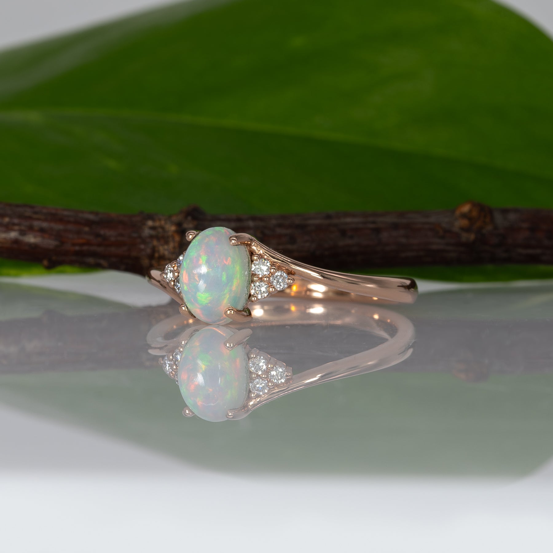 14K rose gold Ethiopian opal cabochon ring with diamond accents