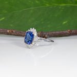 14K white and rose gold tanzanite ring with diamond accents