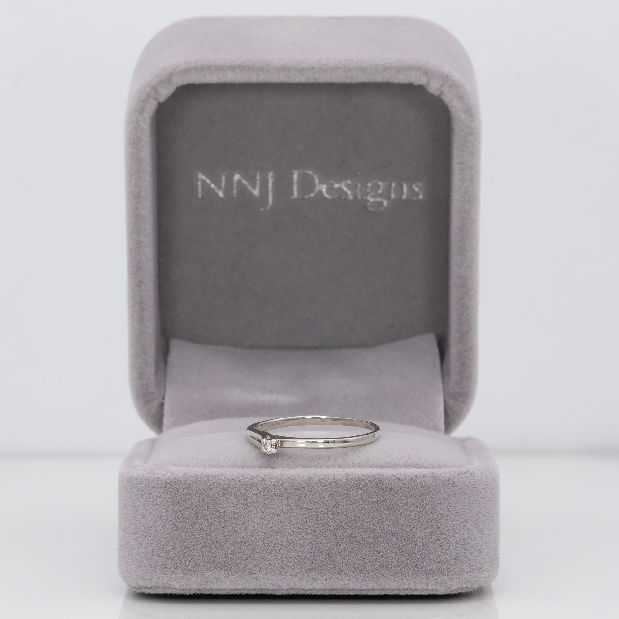 10K white gold single diamond estate ring