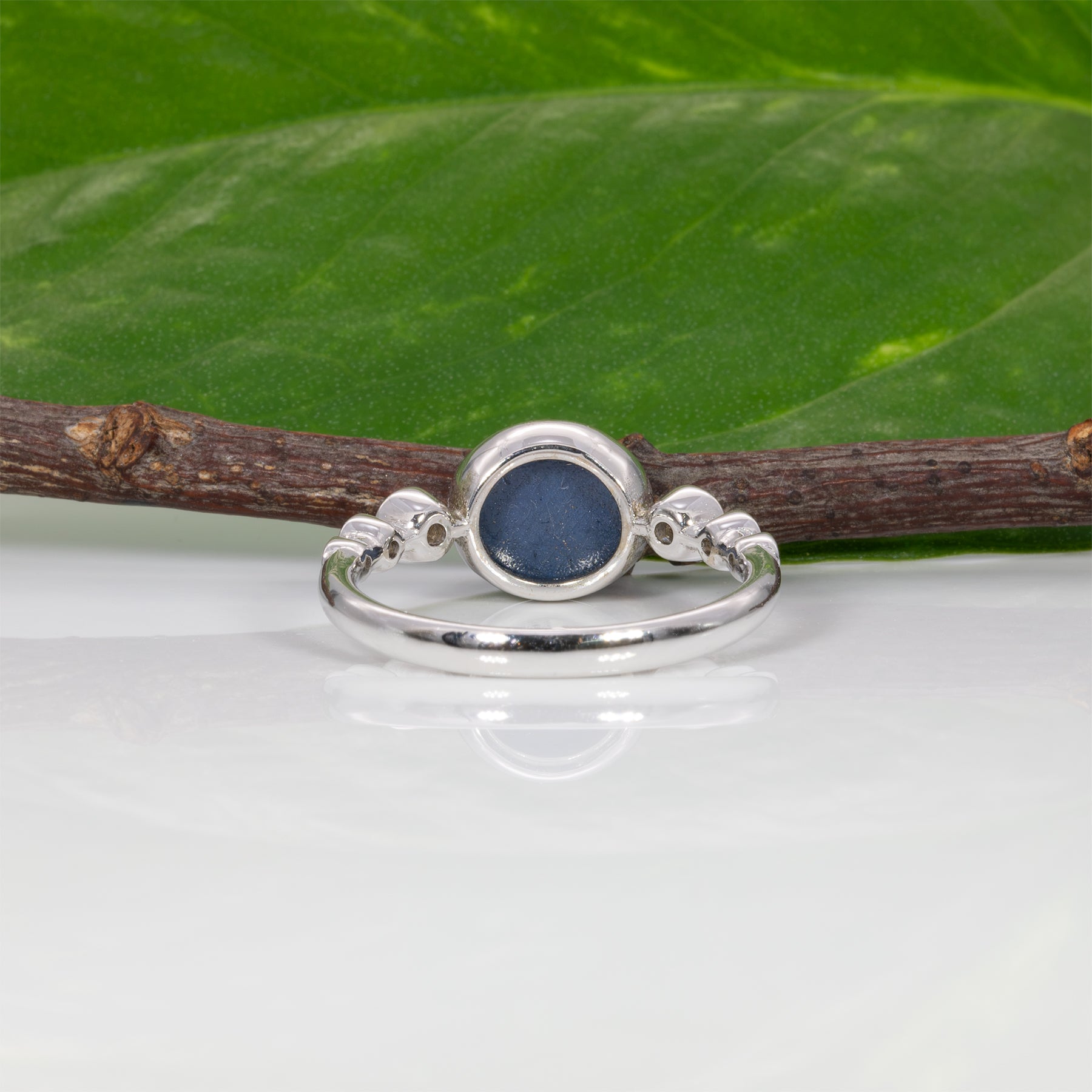 14K white gold blue star sapphire cabochon ring with diamonds