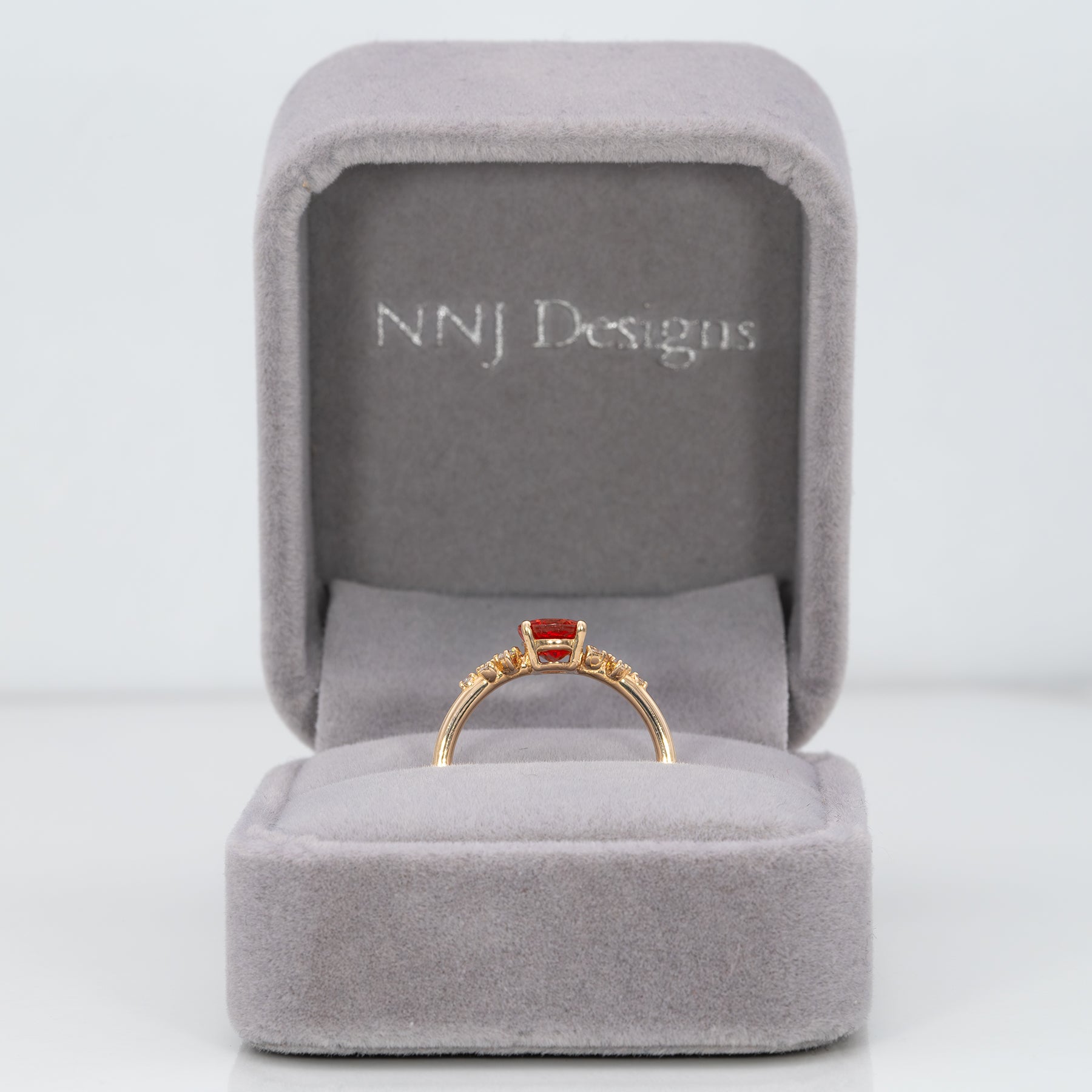 14K yellow gold padparadscha sapphire ring with diamonds
