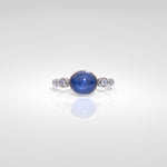 14K white gold blue star sapphire cabochon ring with diamonds