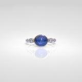 14K white gold blue star sapphire cabochon ring with diamonds