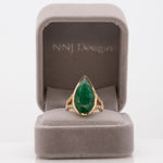 14K yellow gold Zambian emerald pear ring with diamond accents