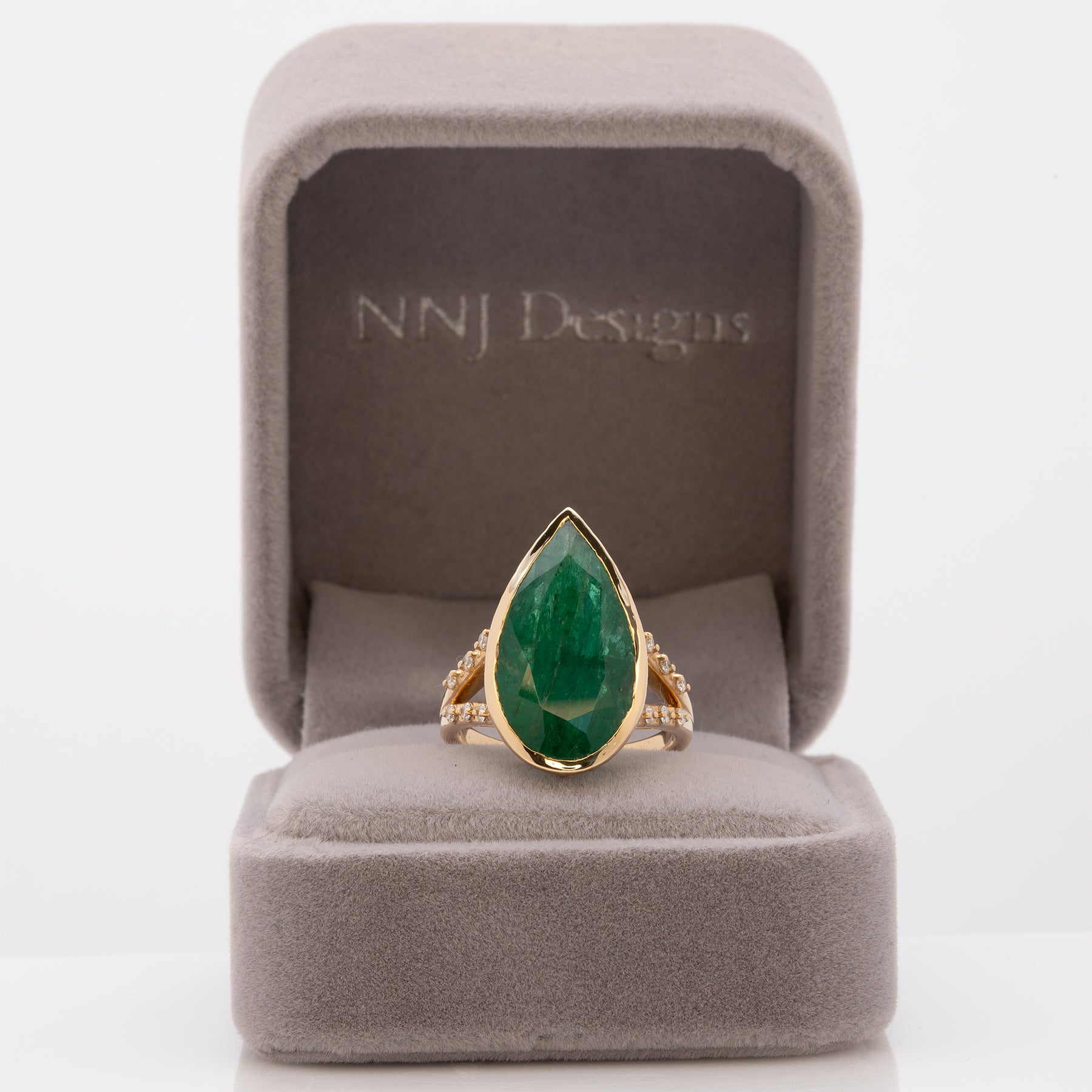 14K yellow gold Zambian emerald pear ring with diamond accents