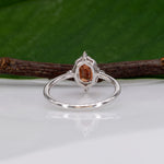 14K white gold padparadscha sapphire ring with diamond halo
