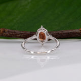 14K white gold padparadscha sapphire ring with diamond halo