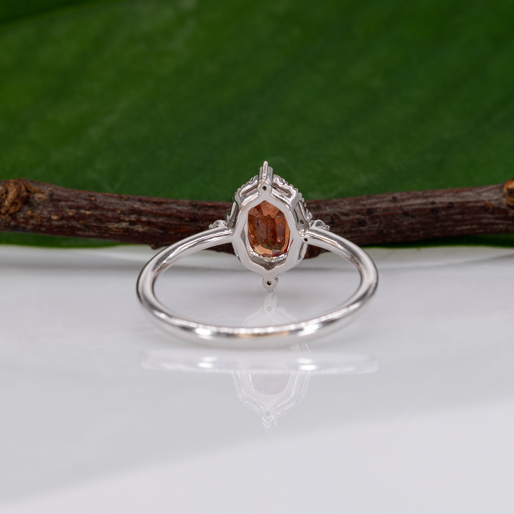 14K white gold padparadscha sapphire ring with diamond halo