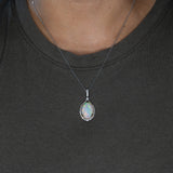 14K white & yellow gold ethiopian opal pendant with diamond accents