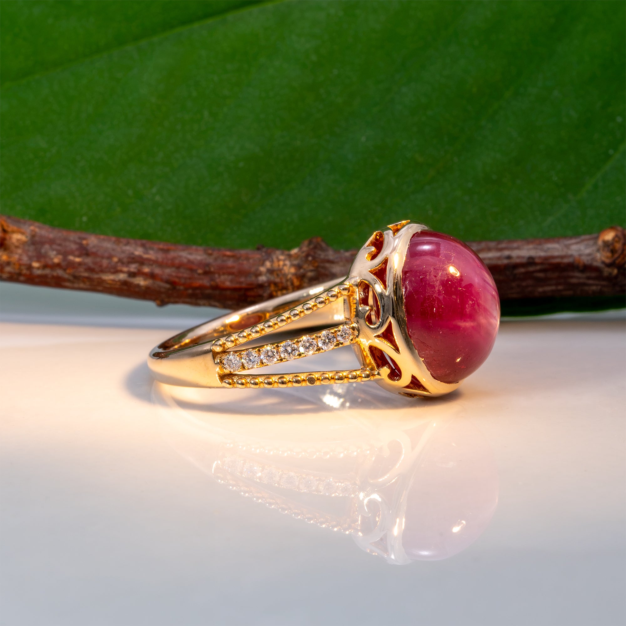 14K yellow gold star ruby cabochon ring with diamond accents