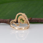 14K yellow gold sphene ring with diamond halo
