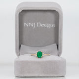 14K yellow gold colombian emerald ring with diamond accents