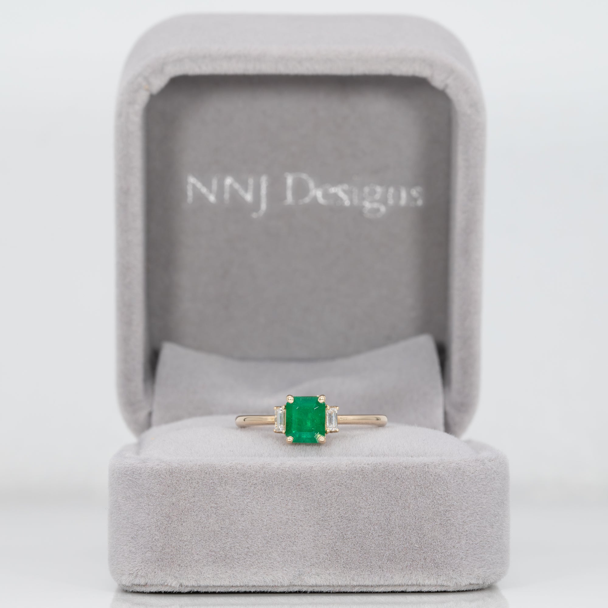 14K yellow gold colombian emerald ring with diamond accents