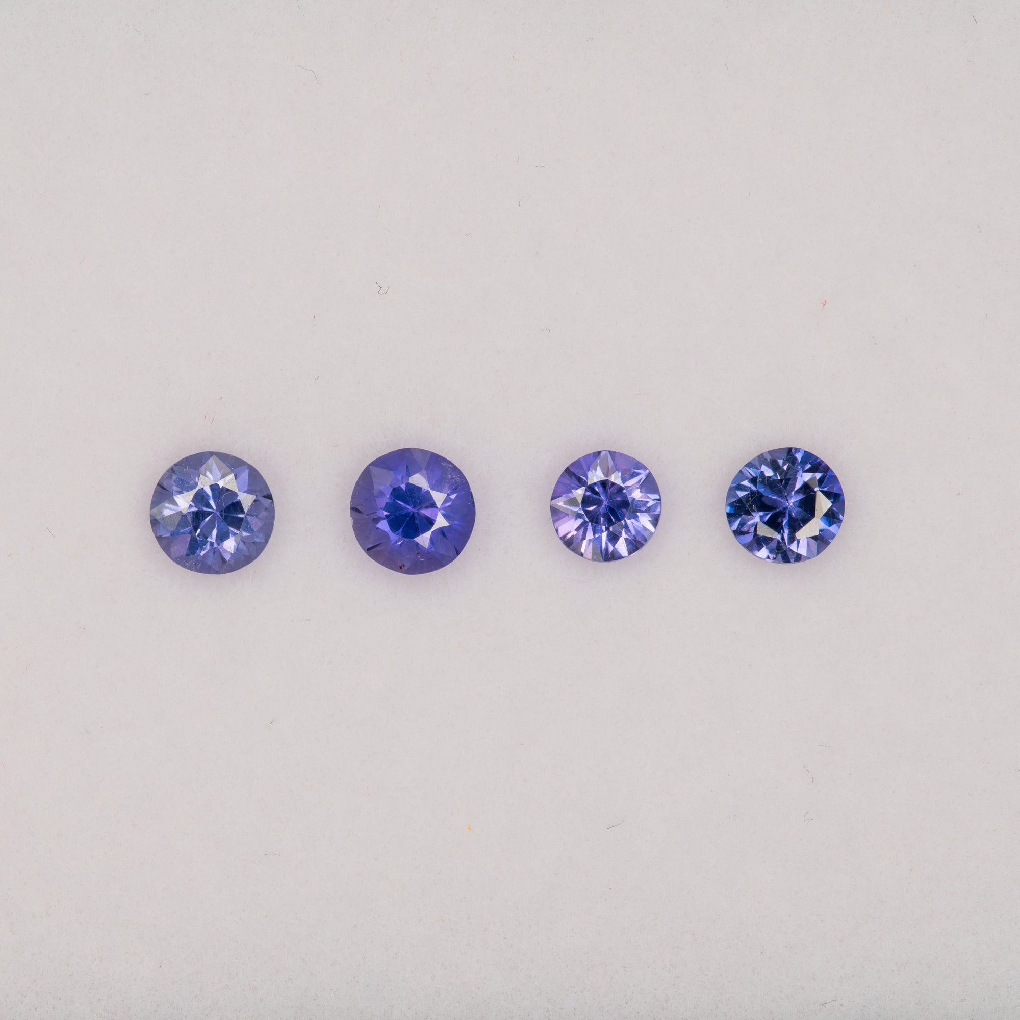 0.21 carat natural blue and purple sapphire, round 3.6mm loose gemstone