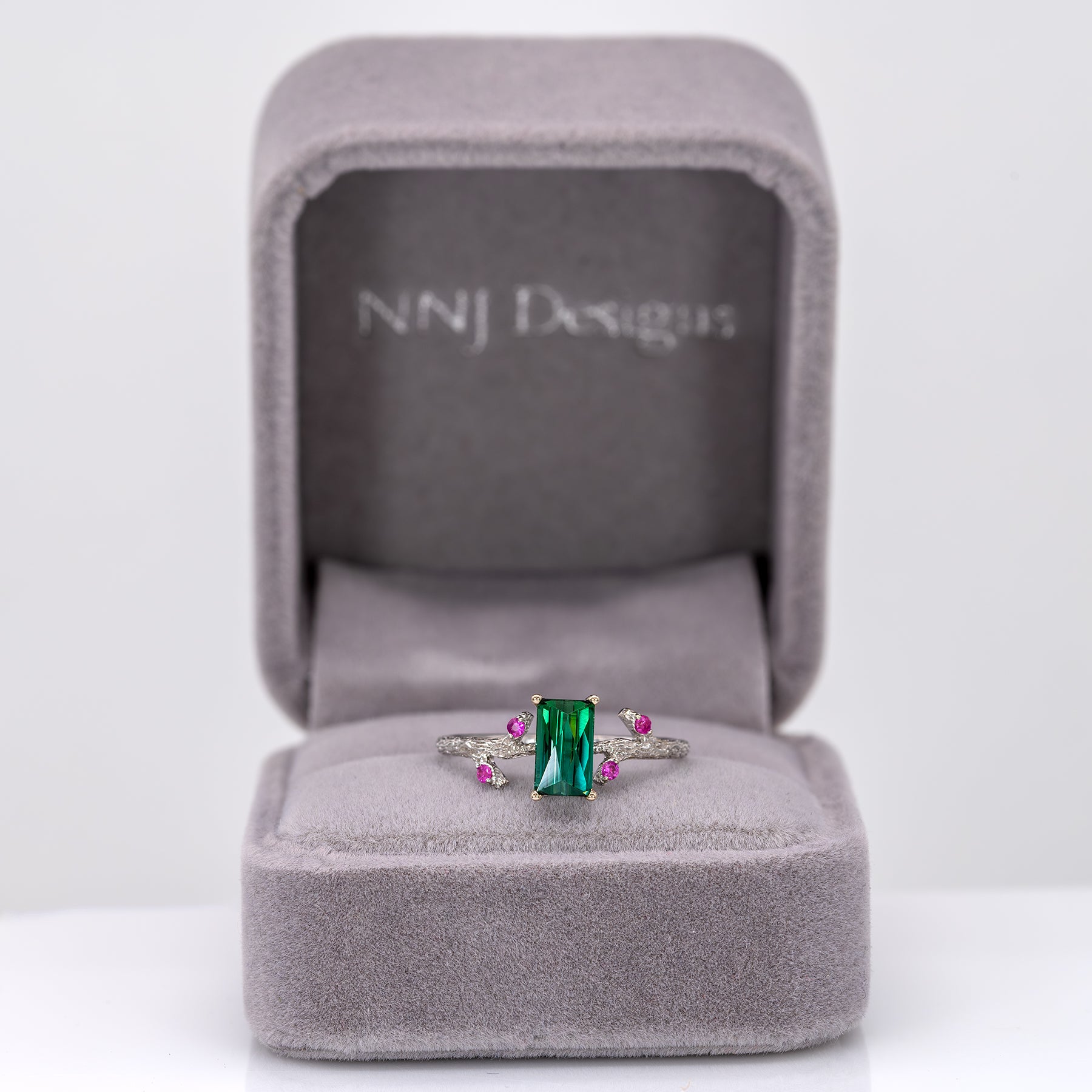 14K white gold indicolite tourmaline ring with pink sapphire accents