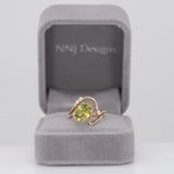 14K yellow gold sphene ring with diamond halo