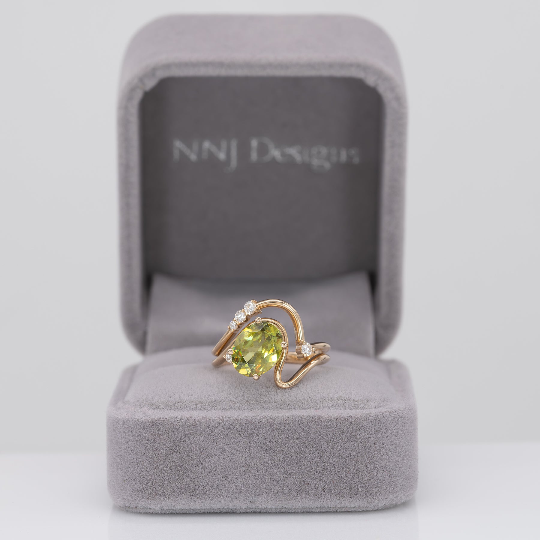 14K yellow gold sphene ring with diamond halo