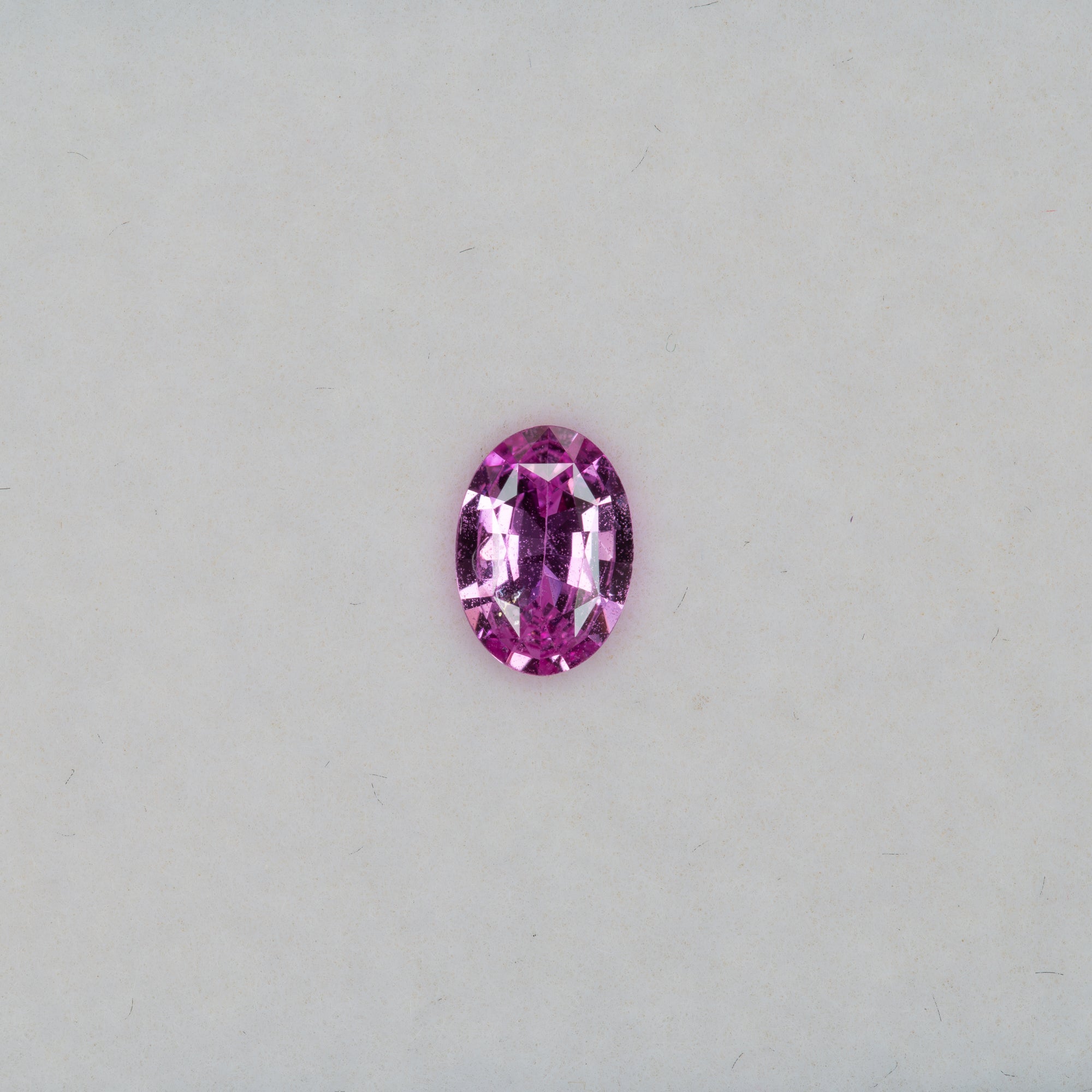 0.69 carat natural pink sapphire, oval 6.9x4.9mm loose gemstone