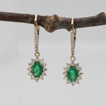 Zambian Emerald Dangle Earrings in 14K Yellow Gold | Diamond Halo | Oval Cut | 6x4mm | May Birthstone