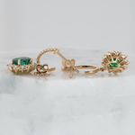 Emerald Stud Earrings in 14K Yellow Gold | Diamond Accents | Oval Cut | 7x5mm | May Birthstone