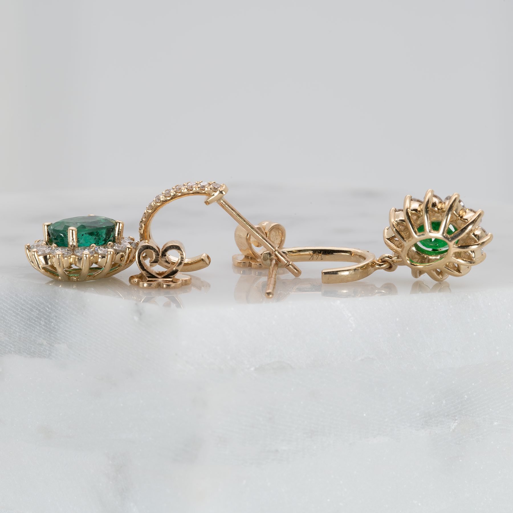 Emerald Stud Earrings in 14K Yellow Gold | Diamond Accents | Oval Cut | 7x5mm | May Birthstone