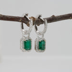14K white gold Zambian emerald earrings with diamond halos