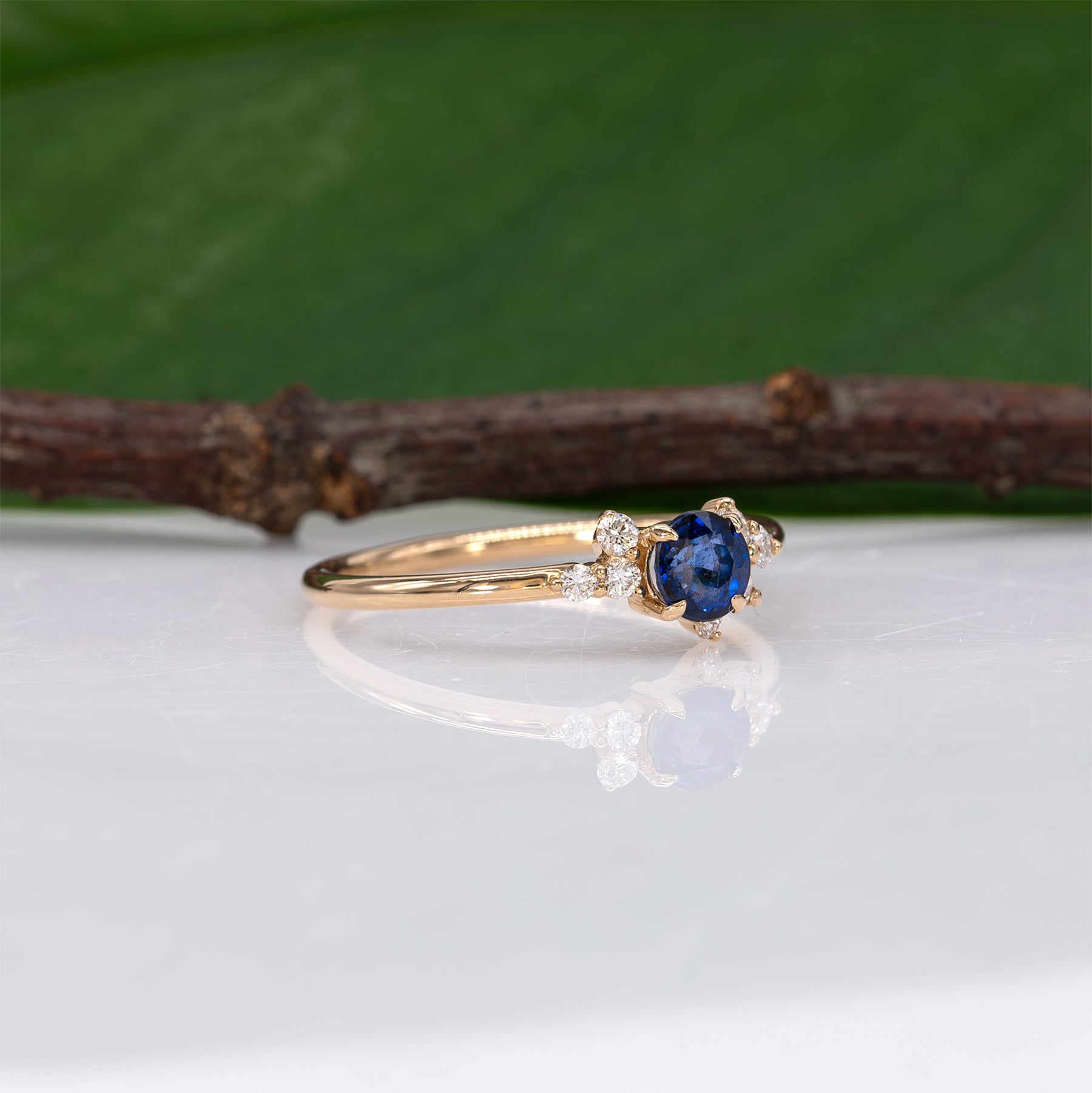 14K yellow gold Ceylon blue sapphire ring with diamond accents