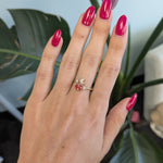 14K yellow gold padparadscha sapphire ring with diamond accents