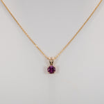 14K yellow gold rhodolite garnet pendant