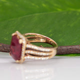 14K yellow gold Madagascar ruby ring with diamond halo