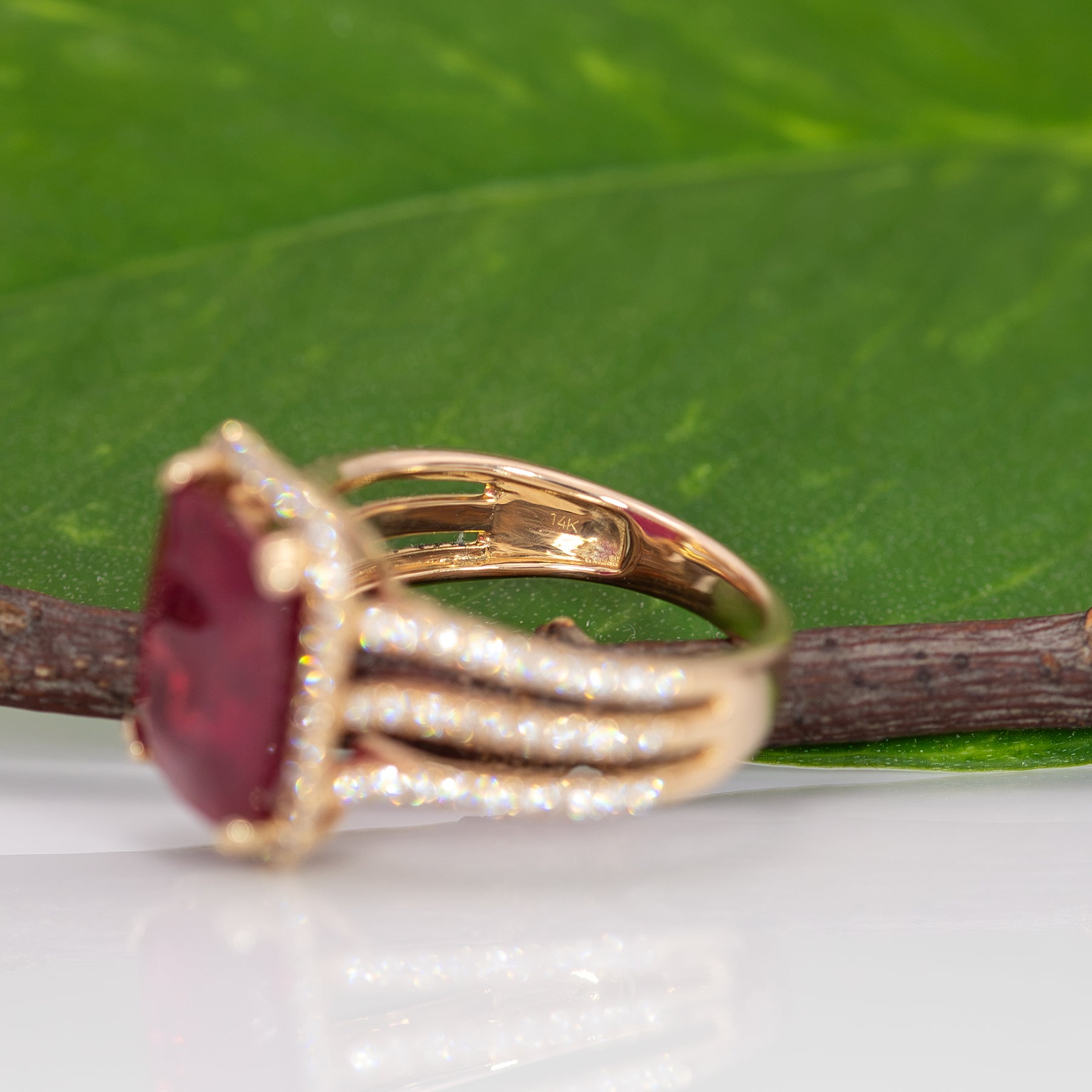 14K yellow gold Madagascar ruby ring with diamond halo