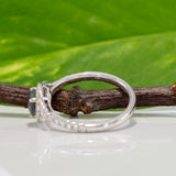 14K white gold pear alexandrite ring with diamond halo