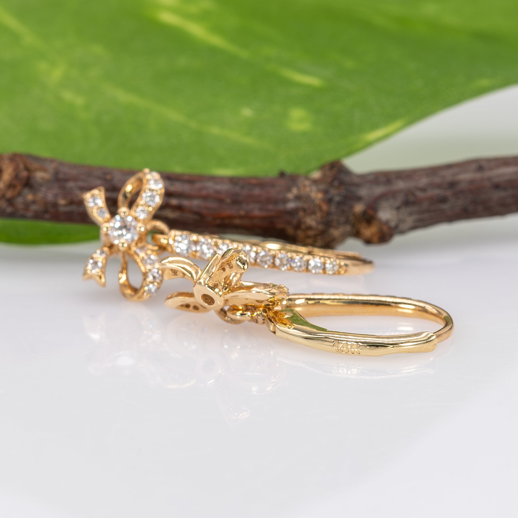 14K yellow gold diamond bow leverback earrings