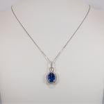 14K white gold tanzanite pendant