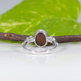 14K white gold boulder opal cabochon ring with tsavorite accents
