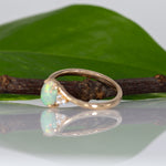 14K yellow gold Ethiopian opal cabochon ring with diamond accents