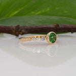 14K yellow gold tsavorite garnet round ring with diamond accents
