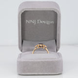 14K yellow gold red spinel ring with pink sapphire accents
