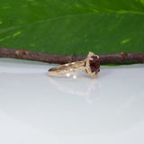 14K yellow gold red spinel ring with diamond accents